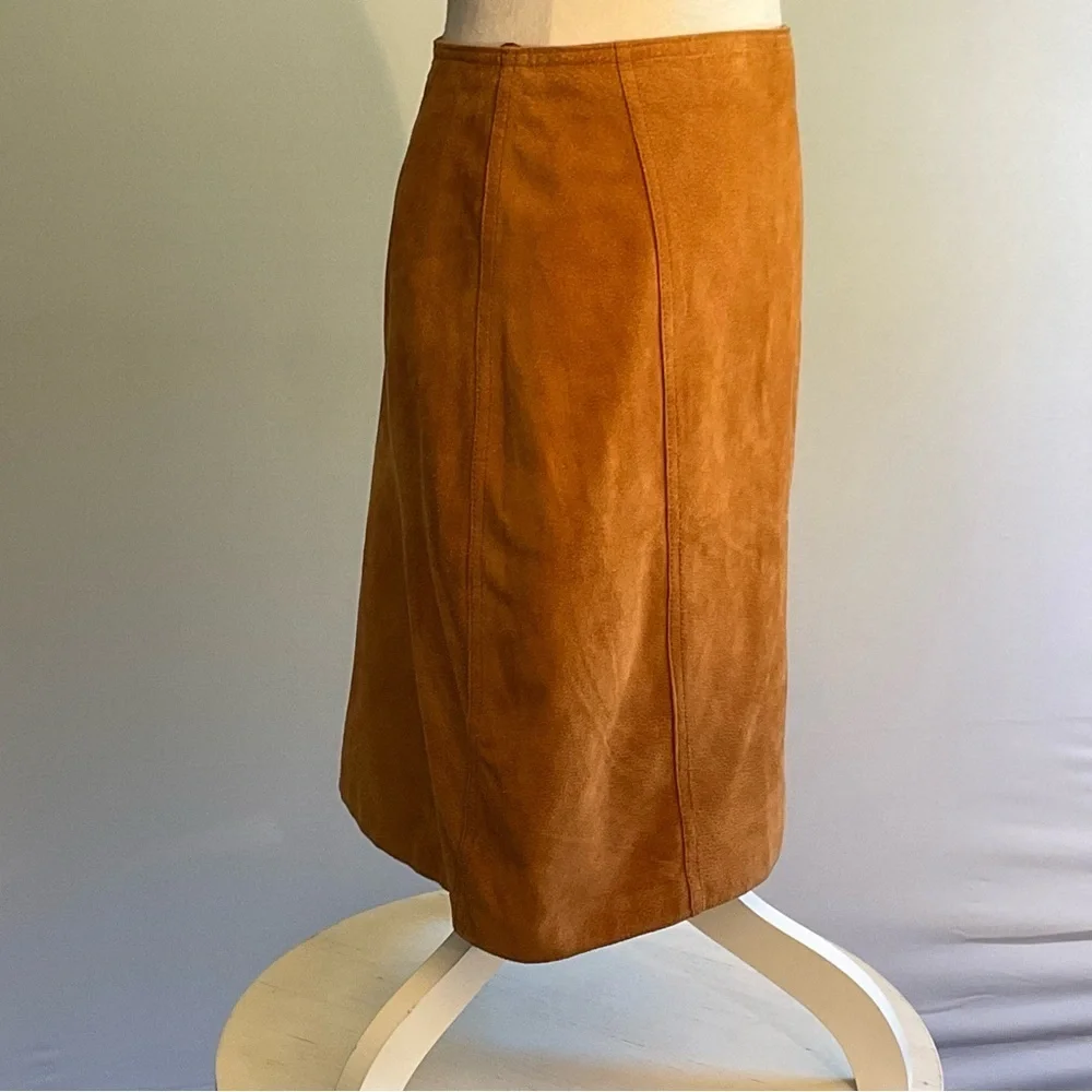 True vintage suede—real leather with clean tailoring an earlier designer era.